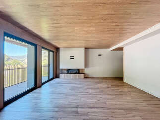 Stunning mountain views from this spacious, open-plan living area.