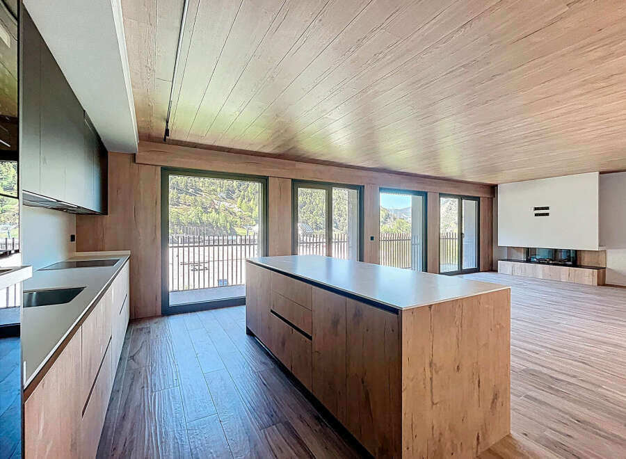 Stunning modern apartment with open-plan living and a sleek kitchen.