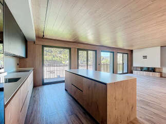 Stunning modern apartment with open-plan living and a sleek kitchen.