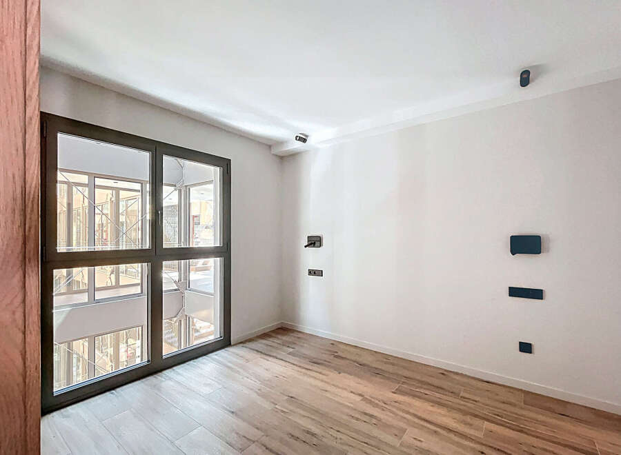 This stunning property boasts a bright and airy interior with large windows offering ample natural light.