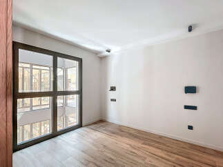 This stunning property boasts a bright and airy interior with large windows offering ample natural light.