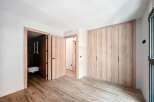 This stunning bedroom boasts a built-in wardrobe with ample storage, perfect for keeping your belongings organized.