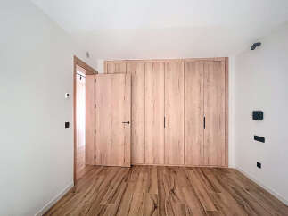 This stunning property boasts a spacious bedroom with built-in wardrobes, offering ample storage solutions.