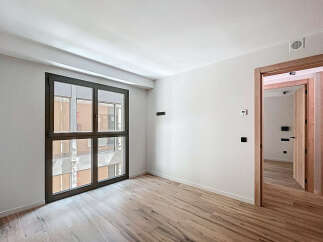 This stunning property boasts a bright and airy interior with large windows offering ample natural light.