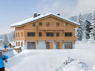 This stunning chalet boasts a prime location in a snow-covered mountain setting.