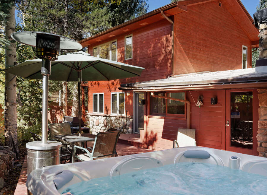 Relax and unwind in your private hot tub after a day of exploring the stunning mountain scenery.
