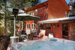 Relax and unwind in your private hot tub after a day of exploring the stunning mountain scenery.