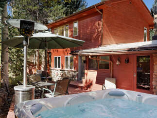 Relax and unwind in your private hot tub after a day of exploring the stunning mountain scenery.