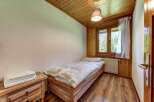 Cozy bedroom with wooden accents.