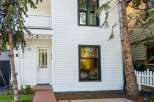 Charming white house with a classic design and modern updates.