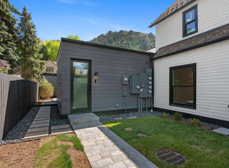 This charming property boasts a private backyard oasis, perfect for relaxation and outdoor enjoyment.