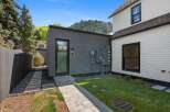 This charming property boasts a private backyard oasis, perfect for relaxation and outdoor enjoyment.