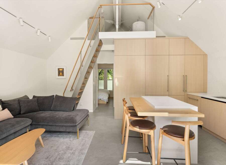 Stunning A-frame home with open-concept living and modern kitchen.