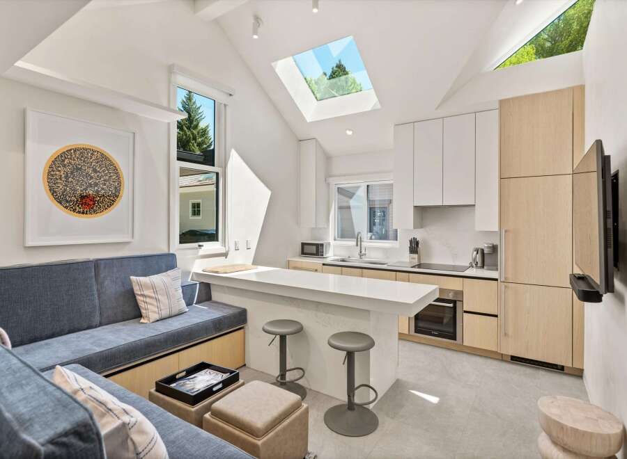 This stunning property boasts a bright, open-concept kitchen with modern appliances and ample counter space.