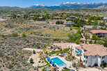 Luxury estate boasting a stunning pool and expansive backyard, perfect for entertaining.