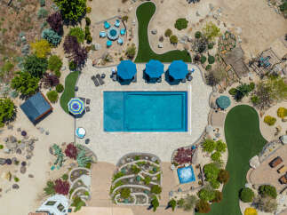 This stunning property boasts a luxurious pool and spa, perfect for relaxation and entertainment.