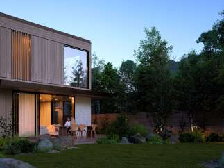 Stunning modern home nestled in a lush forest setting.