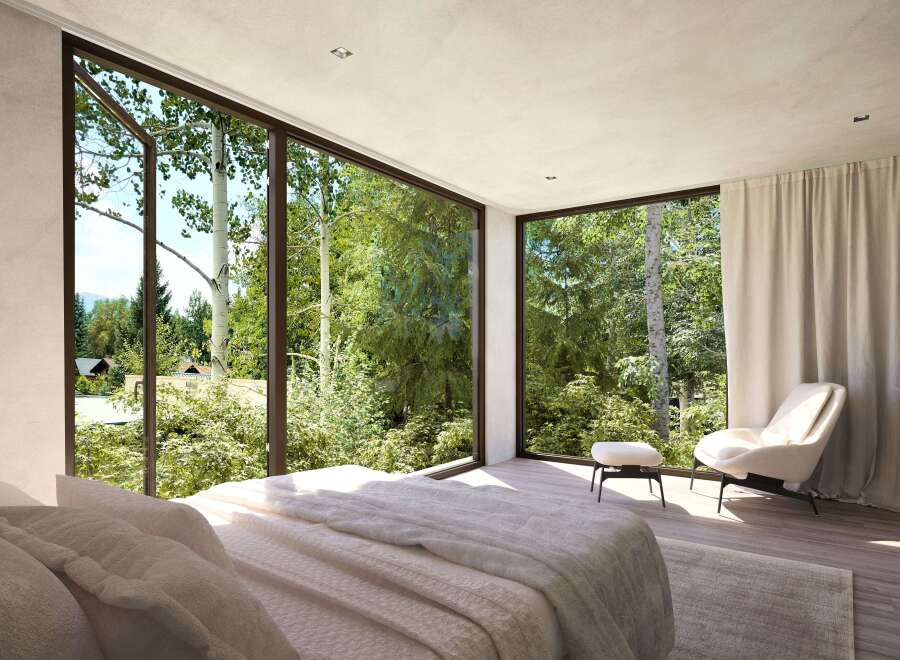Wake up to breathtaking views from this luxurious bedroom, featuring floor-to-ceiling windows showcasing lush greenery.