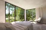 Wake up to breathtaking views from this luxurious bedroom, featuring floor-to-ceiling windows showcasing lush greenery.