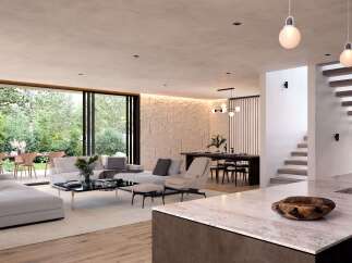 Stunning modern home boasts an open floor plan with floor-to-ceiling windows showcasing a lush garden view.