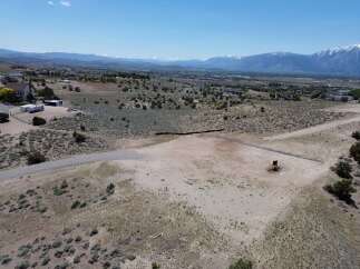 This stunning property boasts breathtaking mountain views and a spacious lot, perfect for building your dream home.