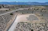 This property boasts stunning mountain views and a spacious, level building site, perfect for your dream home.