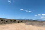This stunning property boasts breathtaking mountain views and expansive desert landscapes.