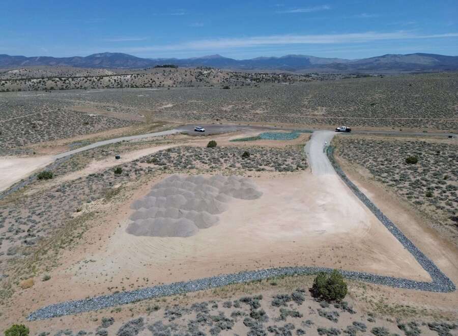 This property boasts a stunning mountain backdrop and expansive desert landscape.