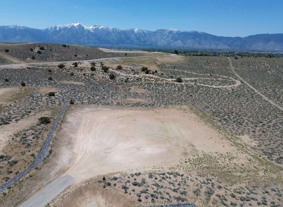 This stunning property boasts breathtaking views of the snow-capped mountains and expansive desert landscape.