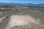 This stunning property boasts breathtaking views of the snow-capped mountains and expansive desert landscape.