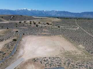 This stunning property boasts breathtaking views of the snow-capped mountains and expansive desert landscape.