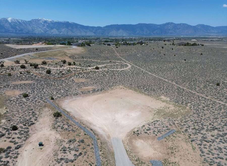 This stunning property boasts breathtaking mountain views and a spacious lot, perfect for building your dream home.