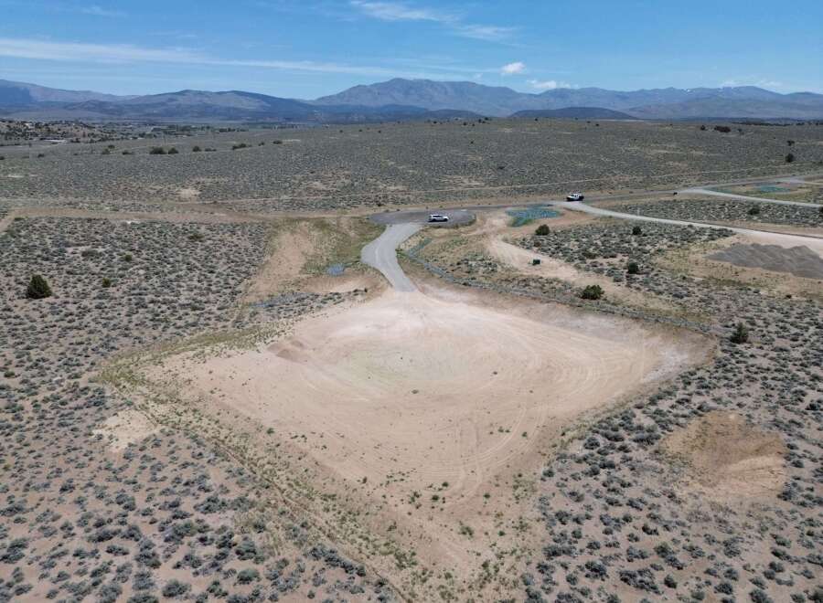 This stunning property boasts a spacious, level lot perfect for building your dream home, offering breathtaking views of the surrounding mountains and desert landscape.