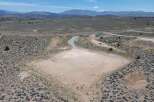 This stunning property boasts a spacious, level lot perfect for building your dream home, offering breathtaking views of the surrounding mountains and desert landscape.