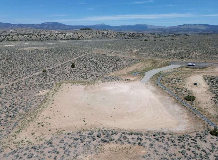 This stunning property boasts breathtaking views of the surrounding mountains and desert landscape.