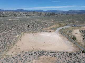 This stunning property boasts breathtaking views of the surrounding mountains and desert landscape.