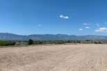 This stunning property boasts breathtaking mountain views and a spacious, level lot, perfect for building your dream home.