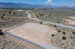 This property boasts stunning mountain views and a spacious, level lot perfect for building your dream home.