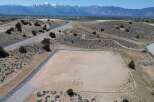 This property boasts a spacious, level lot perfect for building, nestled in a serene desert landscape.