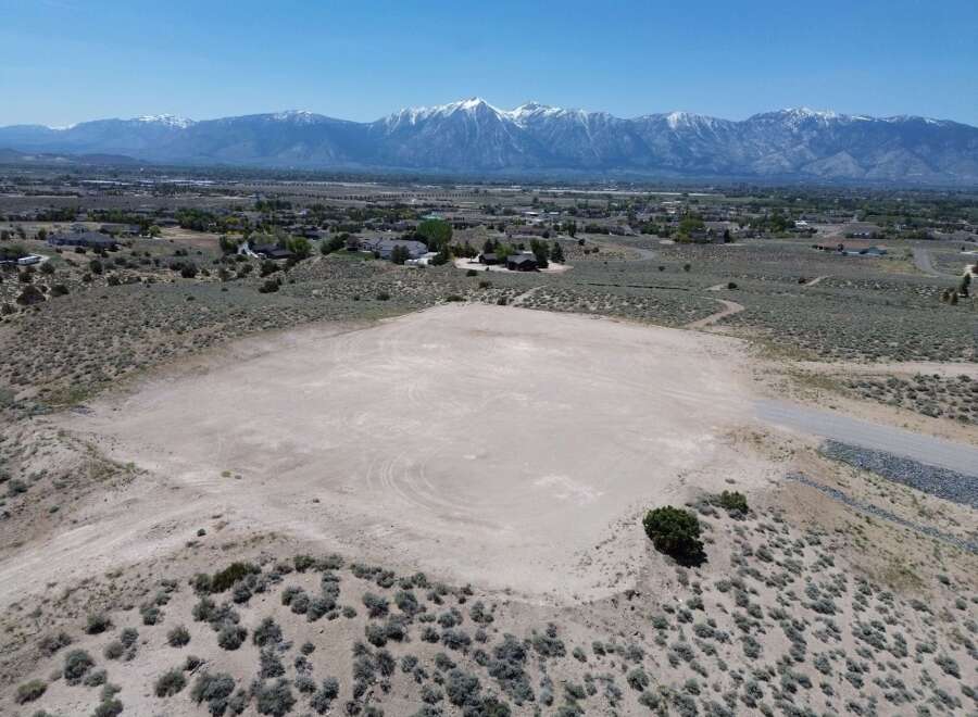 This vacant lot offers a unique opportunity to build your dream home with breathtaking mountain views.