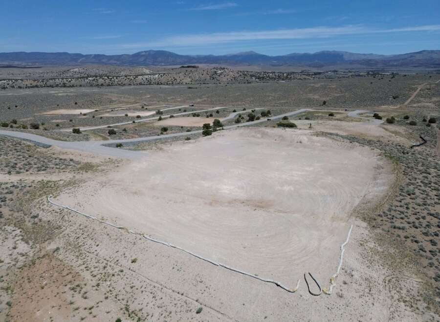 This property boasts a large, flat, and undeveloped area perfect for various uses.