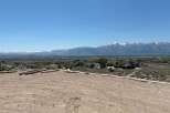 Mountain views and a spacious lot await in this stunning property.