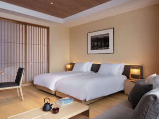 Experience serenity in our minimalist Japanese-style hotel room.