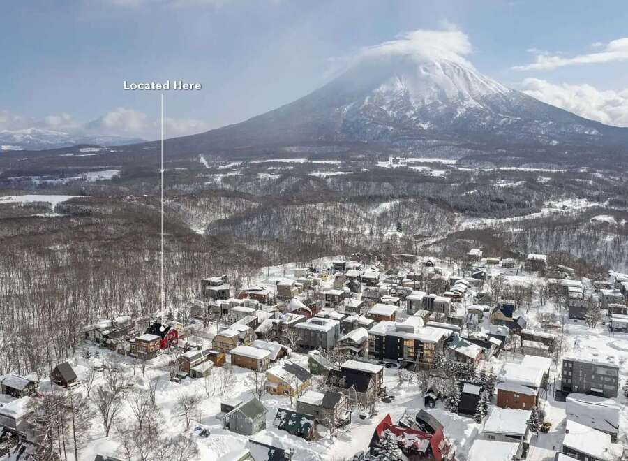 Nestled in a snowy village with breathtaking mountain views, this property offers a serene escape.