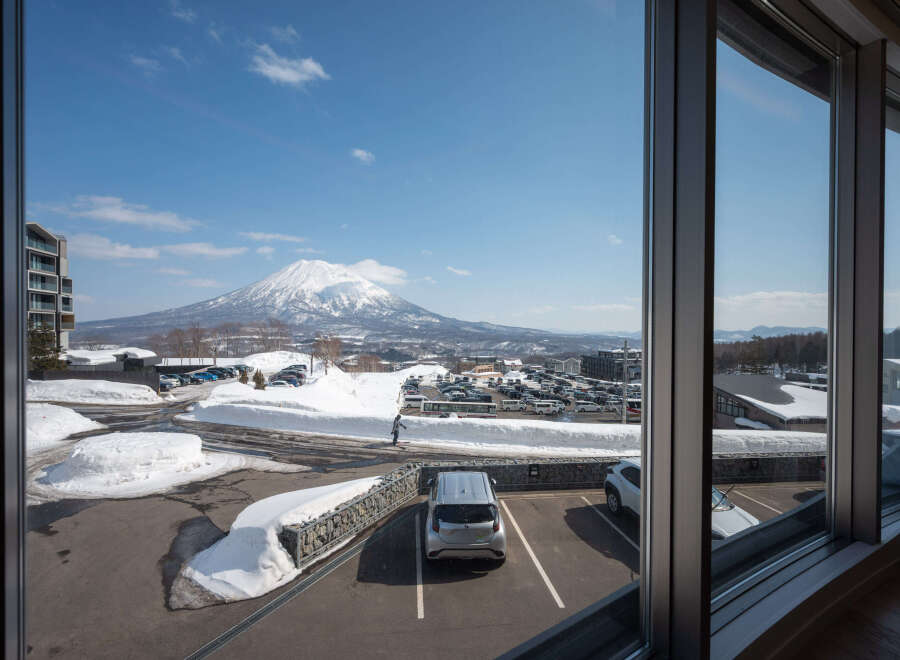 Wake up to breathtaking views of snow-capped mountains from your luxurious hotel room.