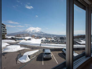 Wake up to breathtaking views of snow-capped mountains from your luxurious hotel room.