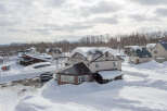 This stunning property boasts a prime location in a snow-covered winter wonderland.