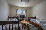 Cozy twin bedroom with mountain views.