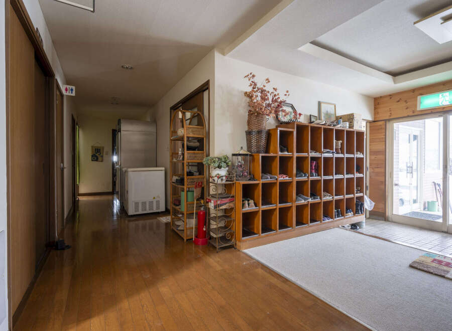 This charming property features a spacious entryway with ample shoe storage, perfect for a family or those who love to entertain.