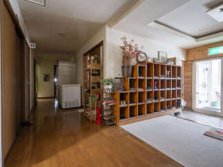 This charming property features a spacious entryway with ample shoe storage, perfect for a family or those who love to entertain.